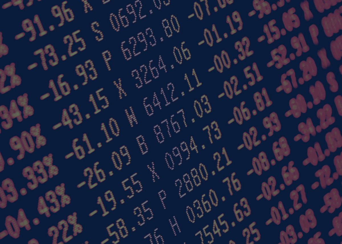 Close-up of a digital display showing a list of numbers, both negative and positive, alongside fluctuating interest rates. The scene resembles a stock market or financial data screen with yellow-orange text on a dark background.